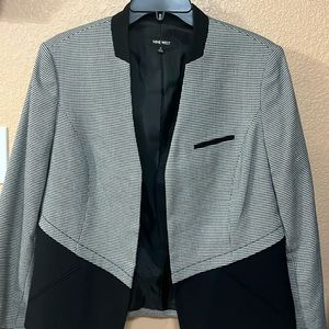 Lightweight black and white blazer.
